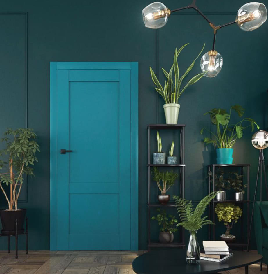 Jasnozielone drzwi z ościeżnicą marki Voster